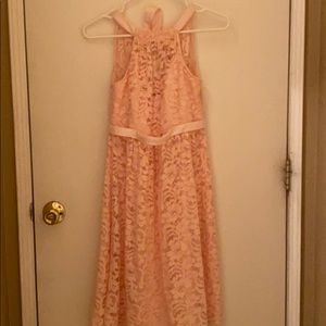 Light pink, bridesmaid dress by David’s Bridal